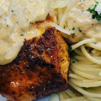 Blackened Salmon With Linguine · Blackened salmon pasta, pasta is tossed in a lemon butter garlic sauce and salmon is top wit...