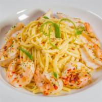 Shrimp Scampi · Loaded with garlícky shrimp and a rich lemon flavor over linguine, this pasta dish comes tog...