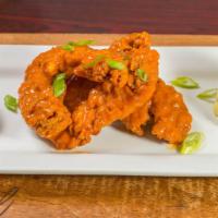 Chicken Tenders · Fried chicken tenders tossed in your choice of (Honey BBQ, sweet chili, buffalo mild or asia...