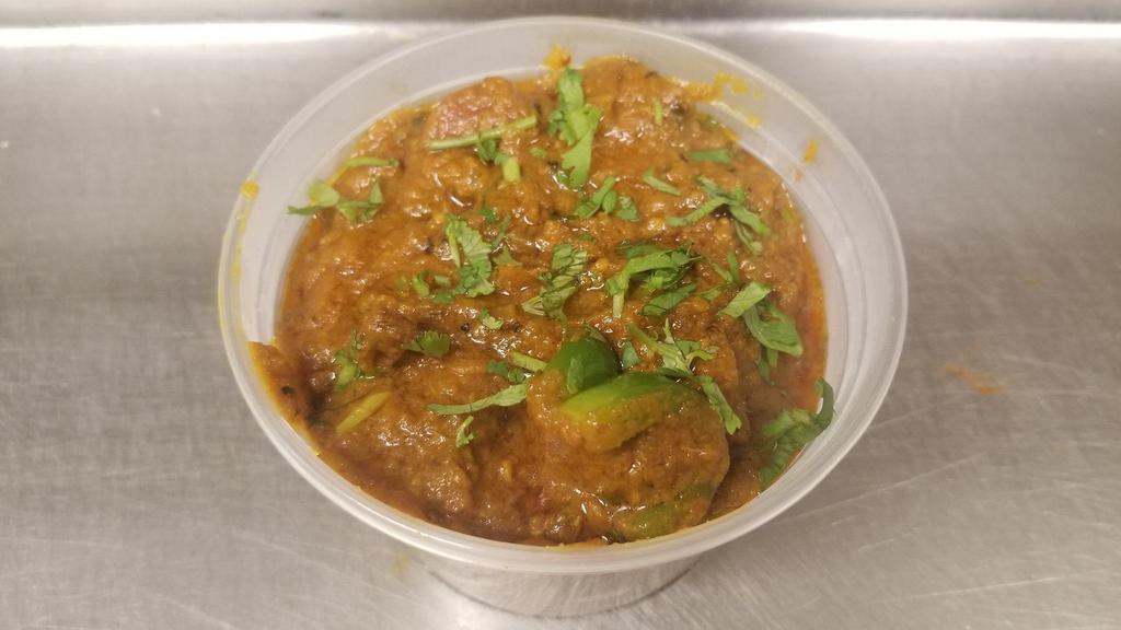 Lamb Acahari · Cooked with Indian lime pickles.