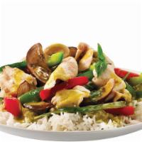 Green Curry · Green curry in coconut milk with Asia eggplant, basil, red bell pepper, bamboo shoot, and ch...