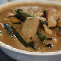 Pumpkin Curry · Special old style Thai curry in coconut milk, made with Thai pumpkin, basil, red bell pepper...