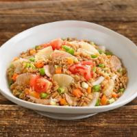 Thai Fried Rice · Thai style fried rice with garlic, onion, tomato, peas, carrots, and egg with choice of chic...
