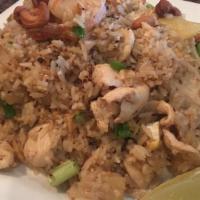 Pineapple Fried Rice · Fried rice with pineapple, spring onion, garlic, egg, and shrimp with choice of chicken, bee...