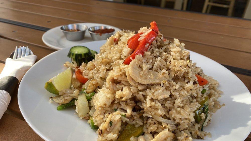 Rice Of The Drunks · Spicy fried rice with basil, chili pepper, red bell pepper, and onion with choice of chicken, beef, or pork.