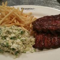Danish Bbq Pork Ribs · Slow-cooked and fall-off-the-bone tender, with french fries and coleslaw.