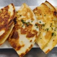 Chicken Quesadilla · Seasoned chicken breast and shredded Cheddar Jack cheese in a crisp grilled tortilla. Served...