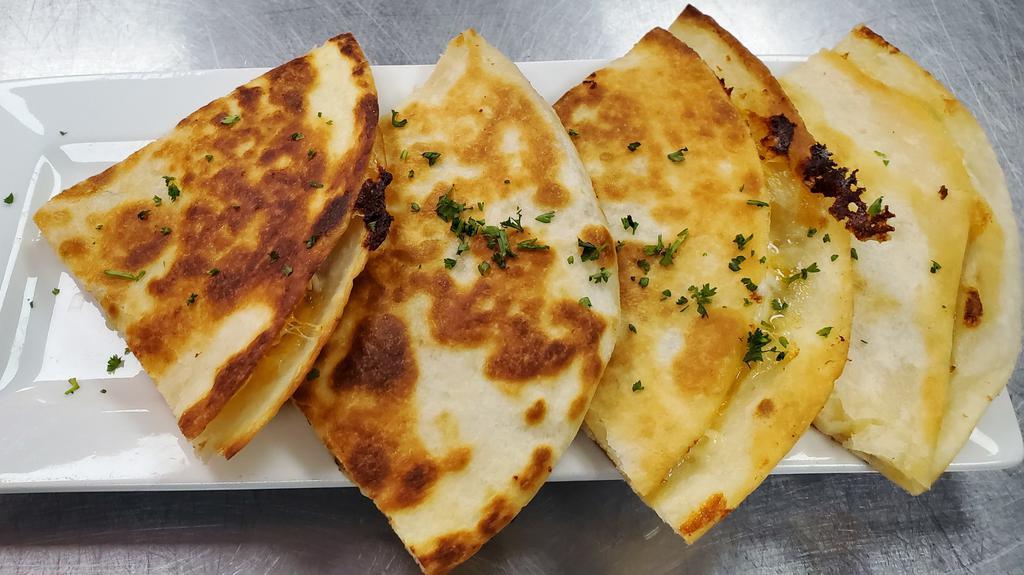 Chicken Quesadilla · Seasoned chicken breast and shredded Cheddar Jack cheese in a crisp grilled tortilla. Served with salsa and sour cream.