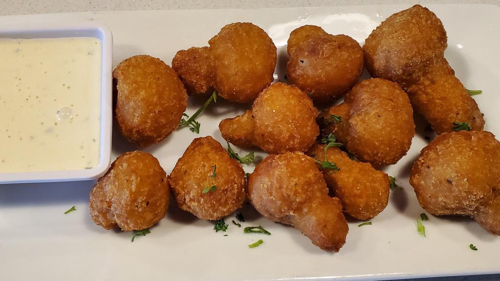 Fried Mushrooms · Classic mushrooms breaded and fried. Served with ranch dip.