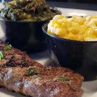 Kc Strip Steak · Choice certified Angus beef strip steak grilled to order and served with your choice of two ...