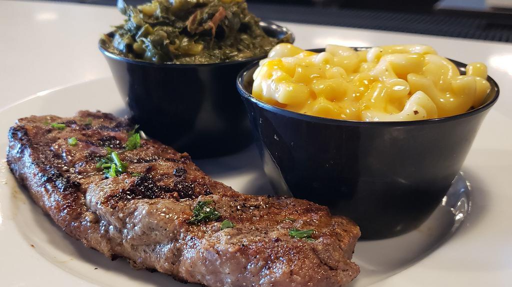 Kc Strip Steak · Choice certified Angus beef strip steak grilled to order and served with your choice of two sides.  Add garlic bread or dinner roll for an additional charge - found in sides.