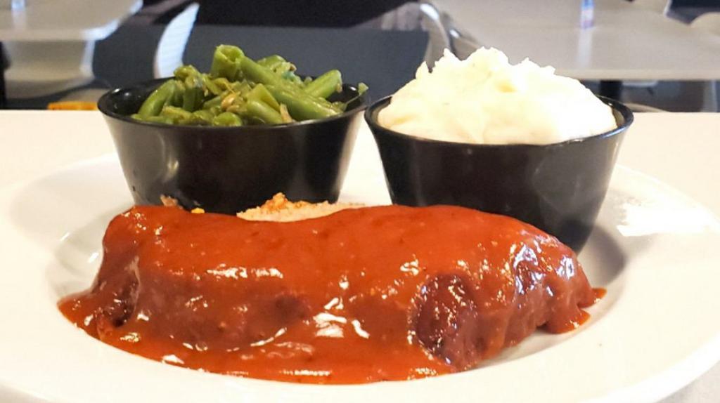 Meatloaf · Our famous soul catching Meatloaf, also comes with 2 sides of your choice.  Add cornbread or dinner roll for an additional charge - found in sides.