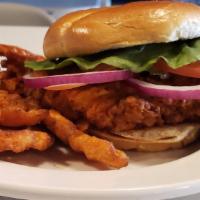 Chicken Sandwich · Your choice of grilled or fried chicken served with lettuce, tomato, onion, and pickle. Spic...