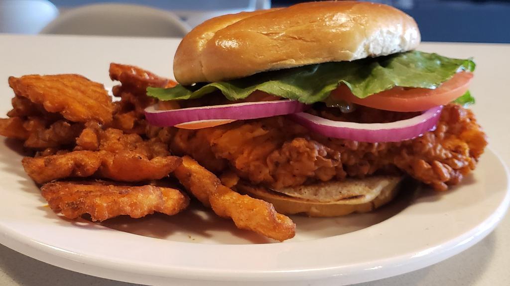 Chicken Sandwich · Your choice of grilled or fried chicken served with lettuce, tomato, onion, and pickle. Spice it up with buffalo sauce upon request. Tell us if you want it grilled or fried.