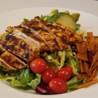 Southwest Chicken Salad · Your choice of grilled or crispy chicken with tortilla strips, roasted corn, and shredded Ch...