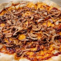 The Roadhouse · Hand tossed Dough with BBQ Sauce, Cheddar Cheese, House Blend Beef, Applewood Bacon, and Cri...