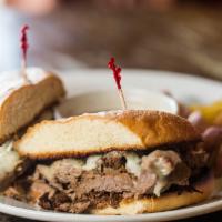 French Dip · Thin sliced roast beef and provolone cheese on a fresh hoagie bun.