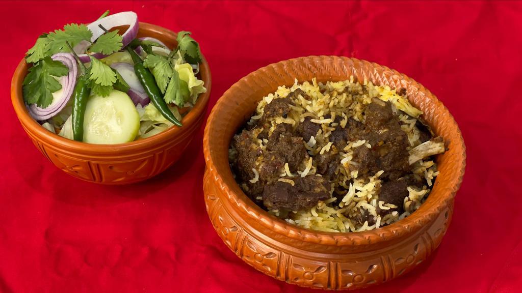Beef Biryani With Raita And Salad · 