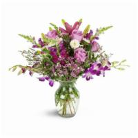 Purple Paradise Orchid Bouquet™ · Orchids, roses, lilies and snapdragons are all stand-alone blooms, but when combined in this...