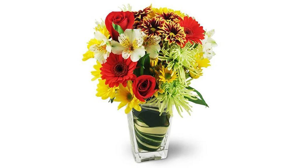 First Impressions · Make your first impression a lasting one with our First Impressions bouquet. This exquisite, elegant arrangement includes roses, gerbera daisies, and mums and will definitely give her something to remember you by.

Red roses, gerbera daisies, alstroemeria, and an assortment of beautiful mums are carefully arranged with variegated aspidistra in a tapered glass vase.

Approximately 10