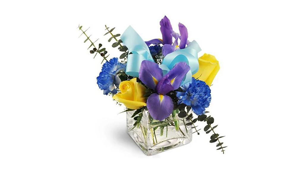Boy, Oh Boy! · Welcome a new face or congratulate a new mom with this awesome arrangement. With a classic yet modern look, this bouquet is a wonderful way to celebrate the occasion! 

Dramatic irises, yellow roses and blue carnations combine to make magic in a clear glass vase. 

Approximately 8