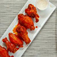 Buffalo Wings Jumbo (New  Low Price ) · 10 pieces. served plain buffalo hot mild hot bbq garlic parmesan served with blue cheese or ...