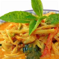 Red Curry · Light coconut red curry with peas, bamboo shoots, peppers and basil leaves.
medium. 
*gluten...