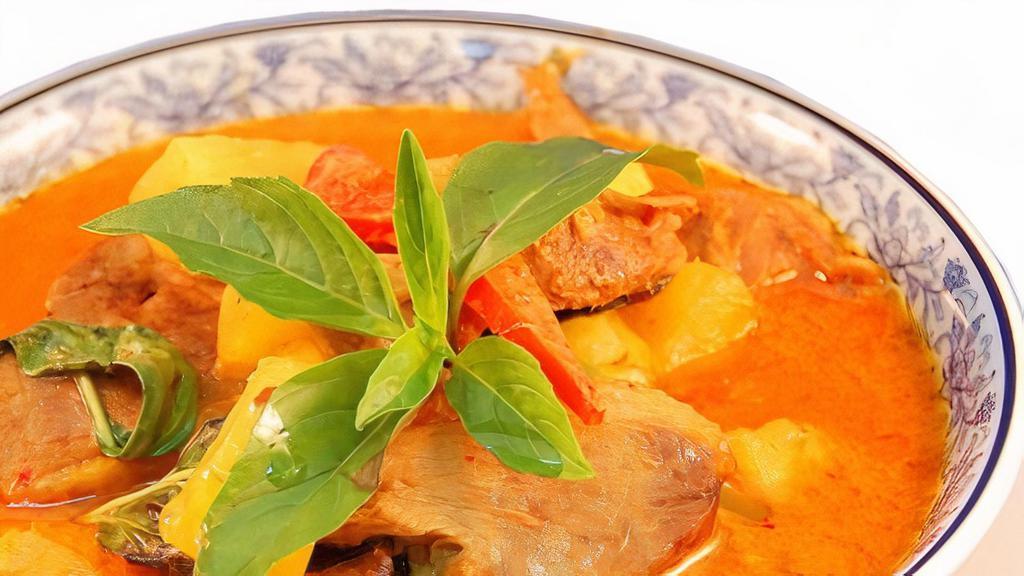 Pineapple Curry · Light coconut red curry with pineapple chunks, peppers, tomatoes, and basil leaves.
medium spicy
*gluten free*