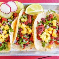 Taco Al Pastor · Onions and cilantro or lettuce and tomato. Pineapple fresh optional.