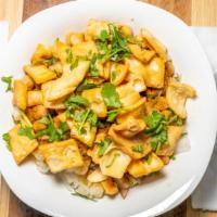 Chaat Papri · Chickpeas, Crunchy Wafers and potatoes topped with yogurt and Tamarind sauce