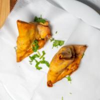 Vegetable Samosa (2 Pieces) · Turned over, stuffed with spicy potatoes and peas