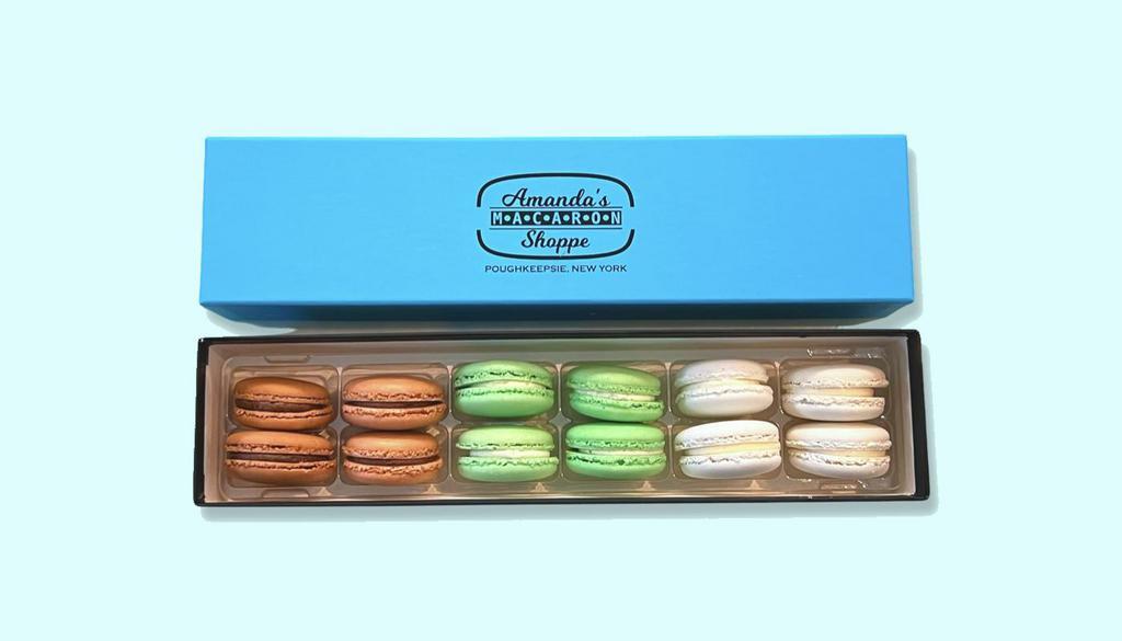 Box Of 12 Of French Macarons - Classic Variety · Variety box of 12, including four Chocolate, four Vanilla, and four Pistachio macarons.