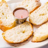 Garlic Bread With Mozzarella Cheese · French garlic bread with mozzarella cheese served with marinara sauce.