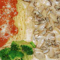 Chicken Angelica · Chicken breast with mushrooms in white wine, and cream sauce. Served with garlic bread.