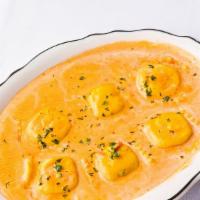 Lobster Ravioli · Ravioli stuffed with lobster meat in a princess creamy pink sauce. Served with garlic bread.