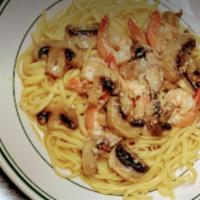 Scampi Monte Cristo · Shrimp sauteed in butter garlic white wine sauce, red pepper flakes and mushrooms. Served ov...