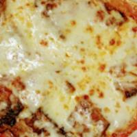Eggplant Parmigiana · Fresh eggplant lightly battered, fried, and topped with mozzarella cheese and tomato sauce. ...