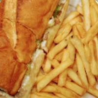 Steak & Cheese Sub · Steak, cheese, lettuce, onions, tomatoes, and mayonnaise. Served on homemade baguette with F...