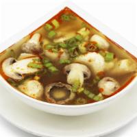 Tom Yum Soup  · Spicy. Spicy lemongrass broth topped w. scallions.