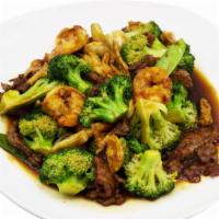 Triple Delight · Served in 32 oz Container w. 6.5 oz of Chicken, 5 oz of Beef, 8pc of Shrimp. Popular. House ...