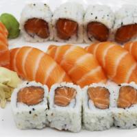 Salmon Or Tuna Feast · Total 16pc. 4 pc. nigiri, 4 pc. Sashimi, plus 1 salmon or tuna roll. Served w. sushi rice.