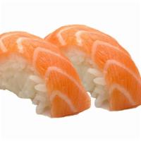 Salmon · Choice of: Sashimi (3 pc.) or Nigiri (2 pc.)
served w. ginger & wasabi.