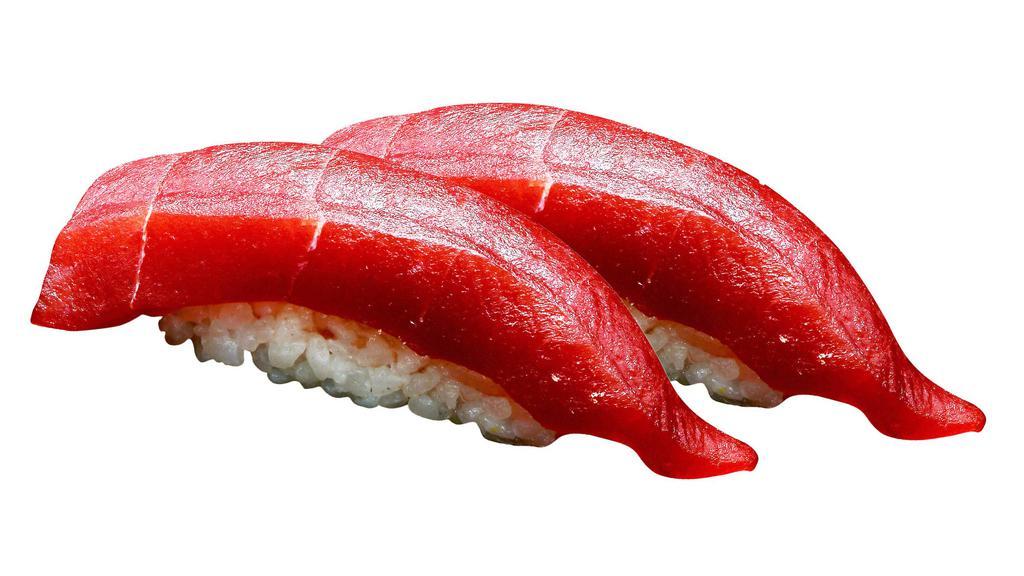 Tuna · Choice of: Sashimi (3 pc.) or Nigiri (2 pc.)
served w. ginger & wasabi.