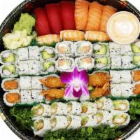 Half Cooked & Half Raw Sushi Tray · 65 pc. assorted raw & cooked sushi rolls. California roll(16 pc),shrimp tempura roll (16 pc)...