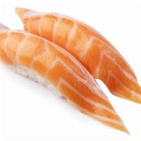 Salmon Belly · Choice of: Sashimi (3 pc.) or Nigiri (2 pc.) served w. ginger & wasabi.
