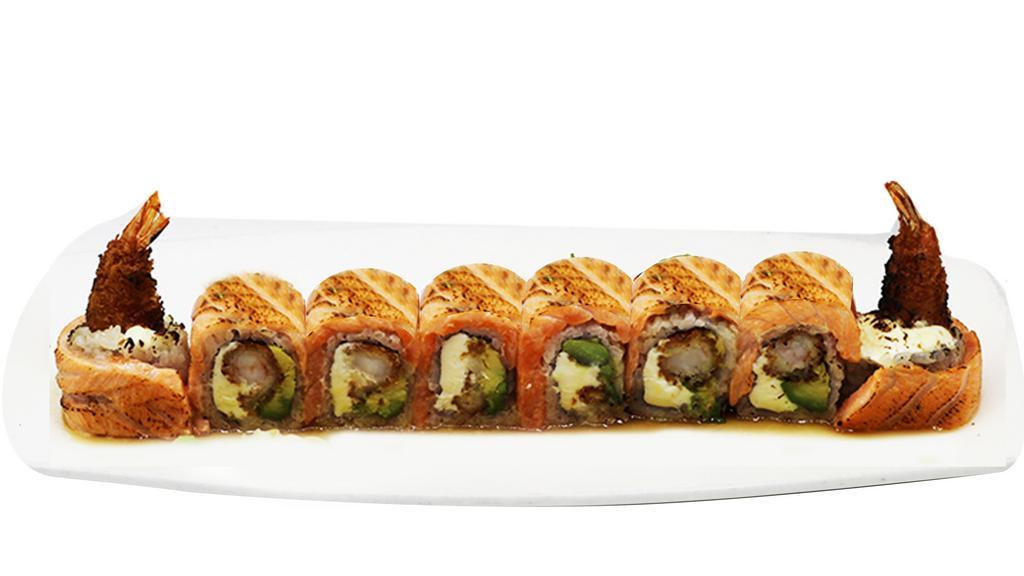 Tiger Roll  (8Pc.) · Inside: Shrimp tempura, avocado, cream cheese. Topped torched salmon. Served W. spicy mayo