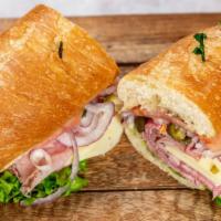 Bean Bag Sub · Ham, salami, and provolone cheese on a sub roll with Italian dressing, lettuce, and tomato. ...