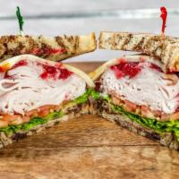 The Swedish Treat · Turkey, muenster cheese, and lingonberries on rye with bean bag special mustard, lettuce, an...