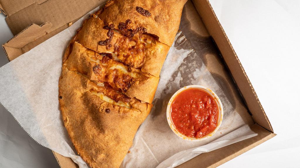 Pepperoni And Cheese Calzone · Made with mozzarella and cheddar cheese and includes 1 side of sauce.