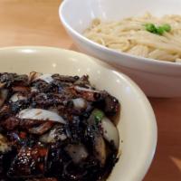 야채 간짜장/ Veggie Gan Ja Jang · Served with sauté onions, green peas and carrots in a black bean sauce
